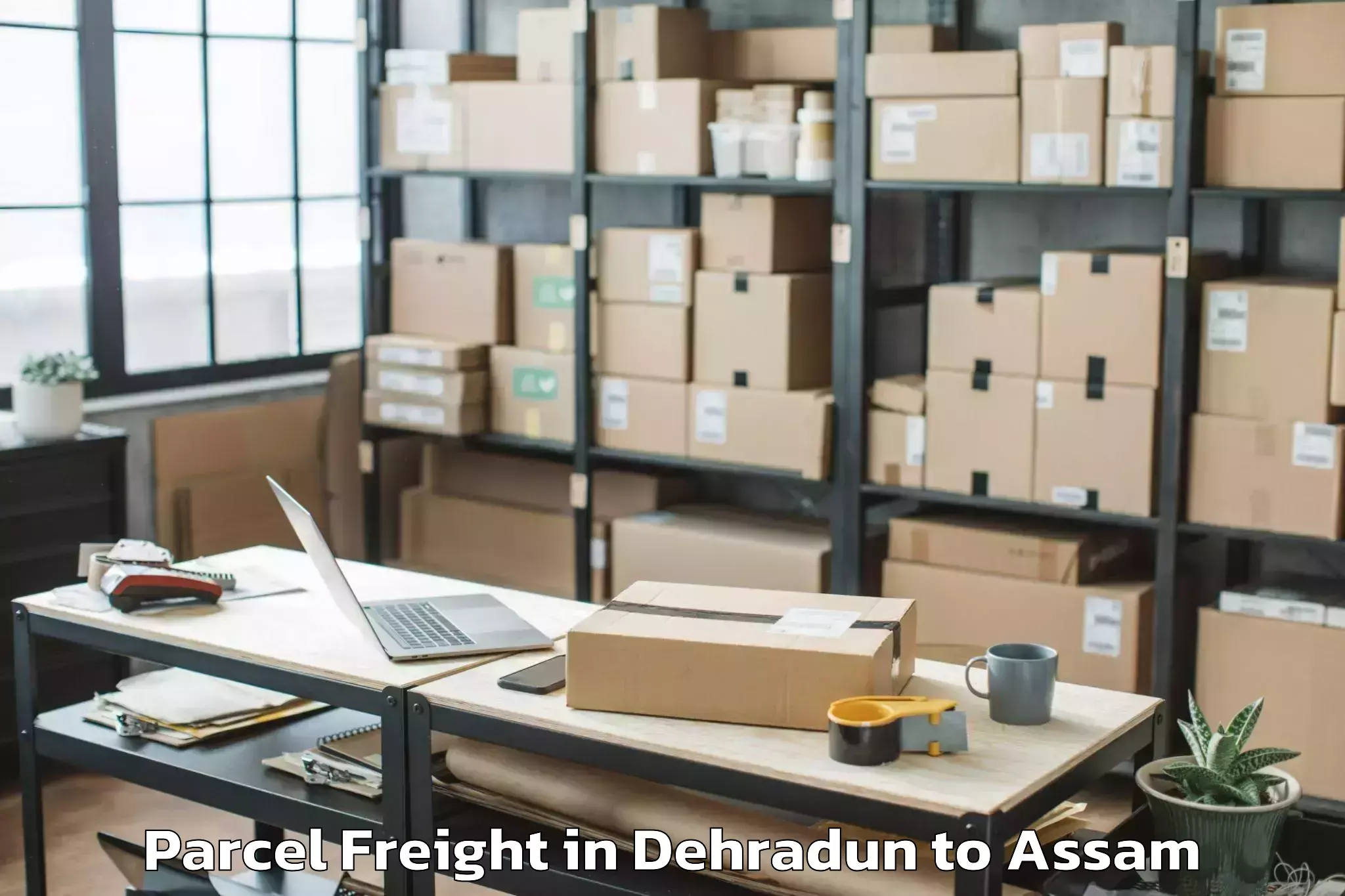 Leading Dehradun to Dhuburi Parcel Freight Provider